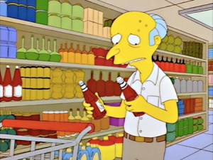 ABOVE: David Brooks, forced to do his own grocery shopping, uses his copious mental equipment to ponder the "ketchup v. catsup" dilemma.