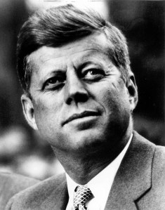 Noted Arch-Conservative John F. Kennedy. Right here he's thinking, "God, I just wish there were a food stamp program so that I could cut its benefits."